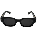 Black sunglasses with gold accents on a white background