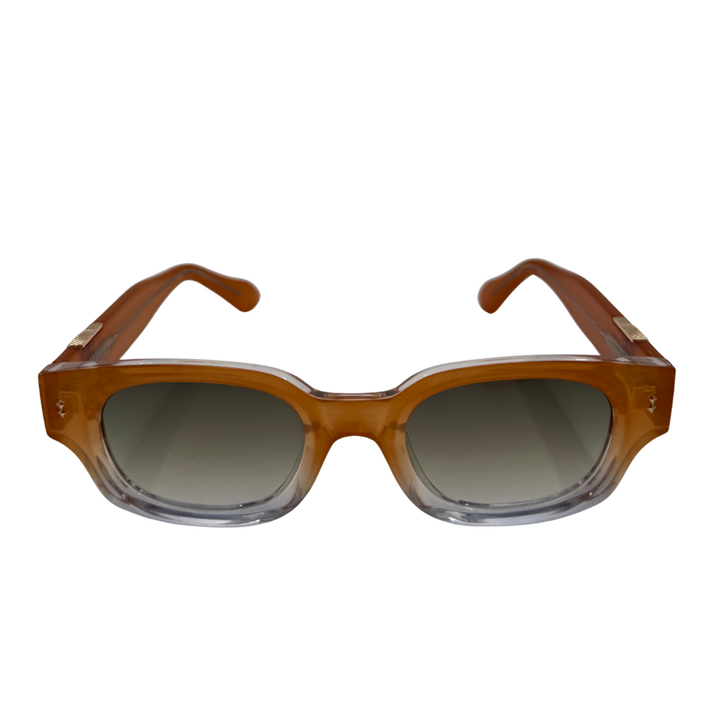 Brown sunglasses with clear lenses on a white background