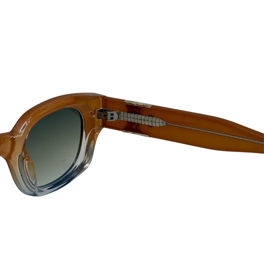 Brown sunglasses with a gradient lens on a white background