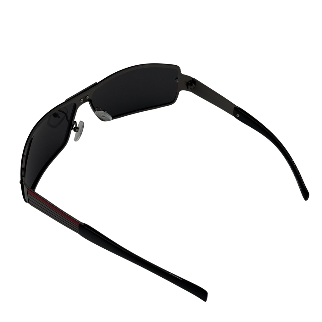 Black sunglasses with a red accent on a white background