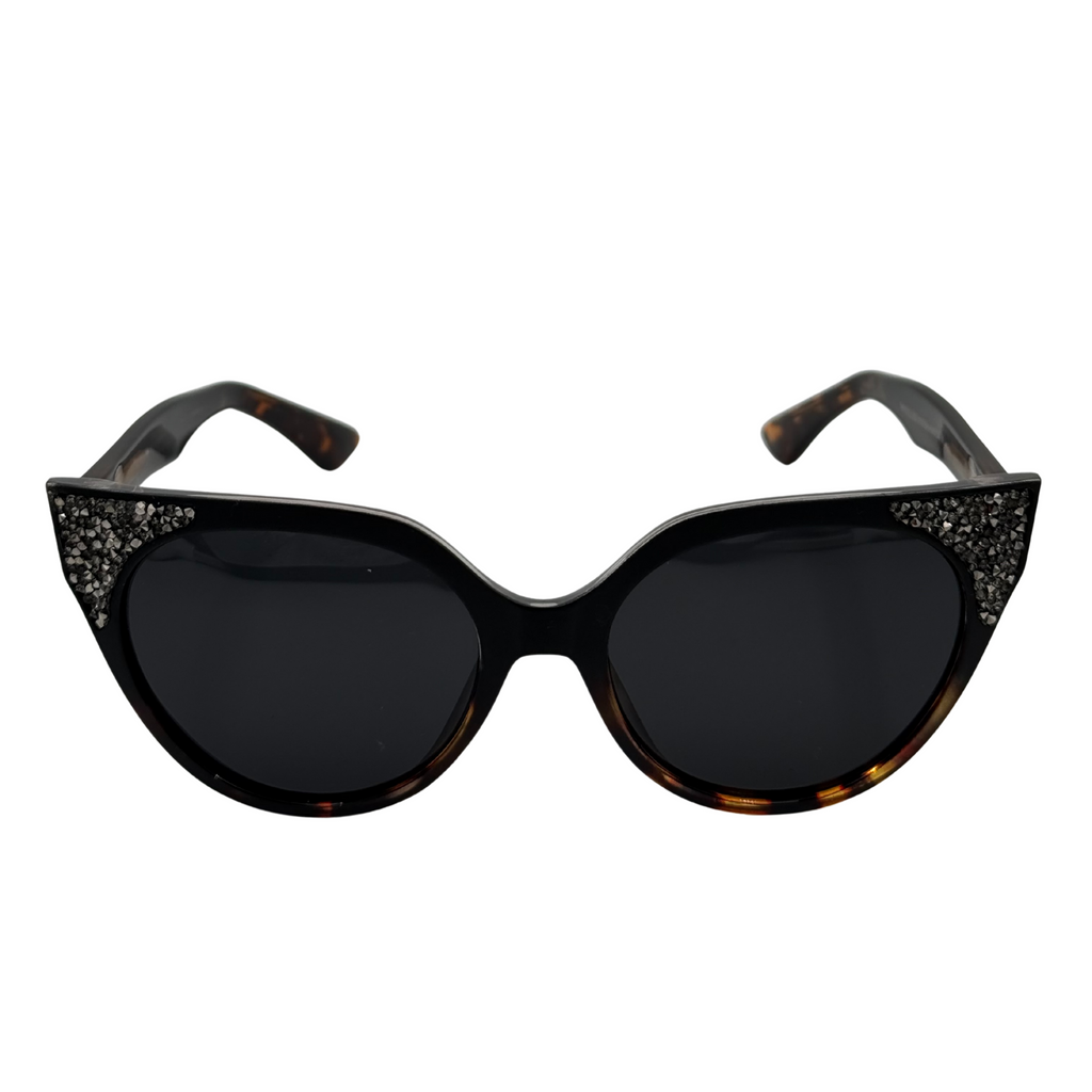 Black cat-eye sunglasses with glittery temple tips on a white background