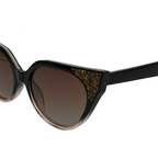 Black cat-eye sunglasses with brown lenses on a white background