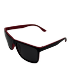 Sunglasses with black lenses and red frame on a white background