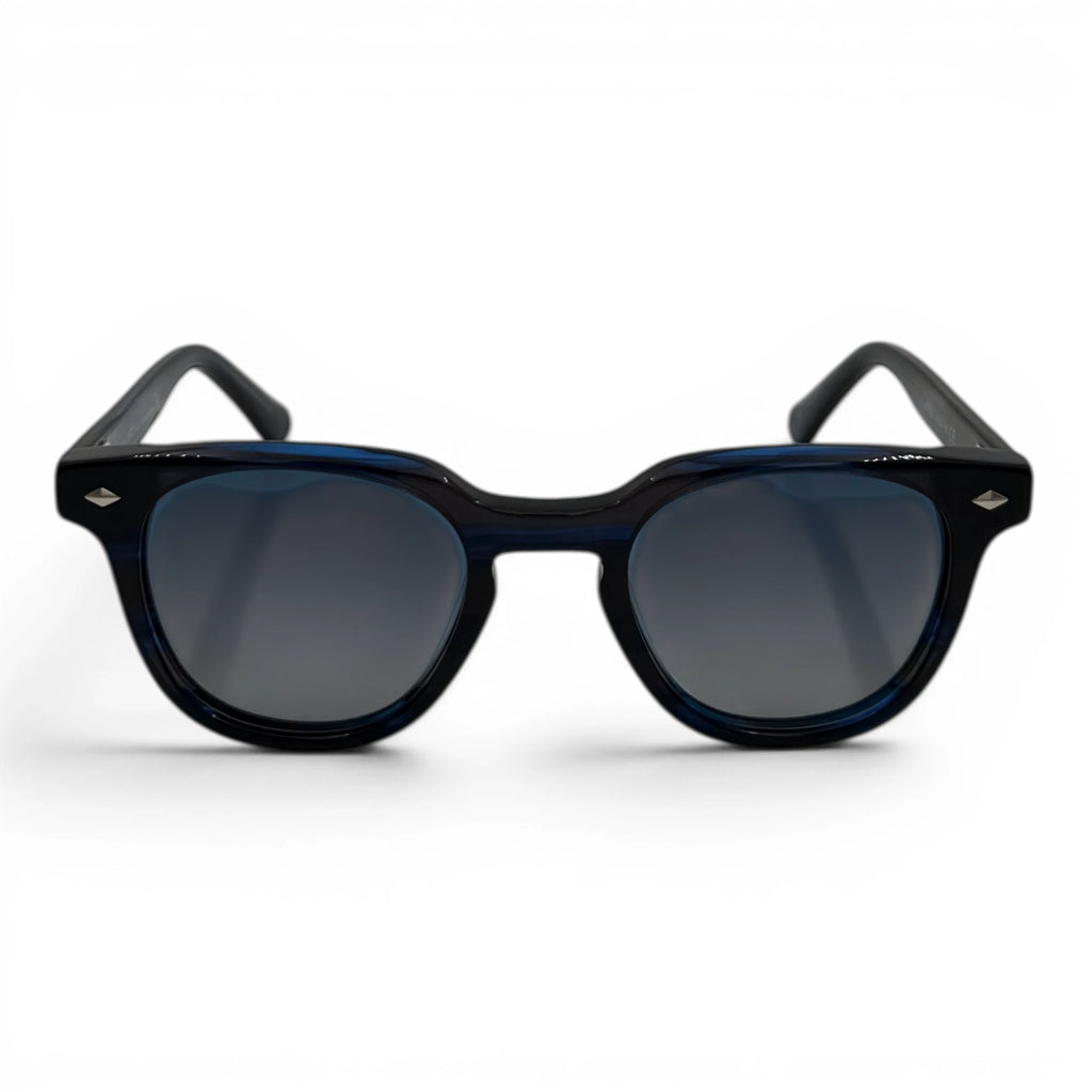 Navy sunglasses with dark lenses on a white background