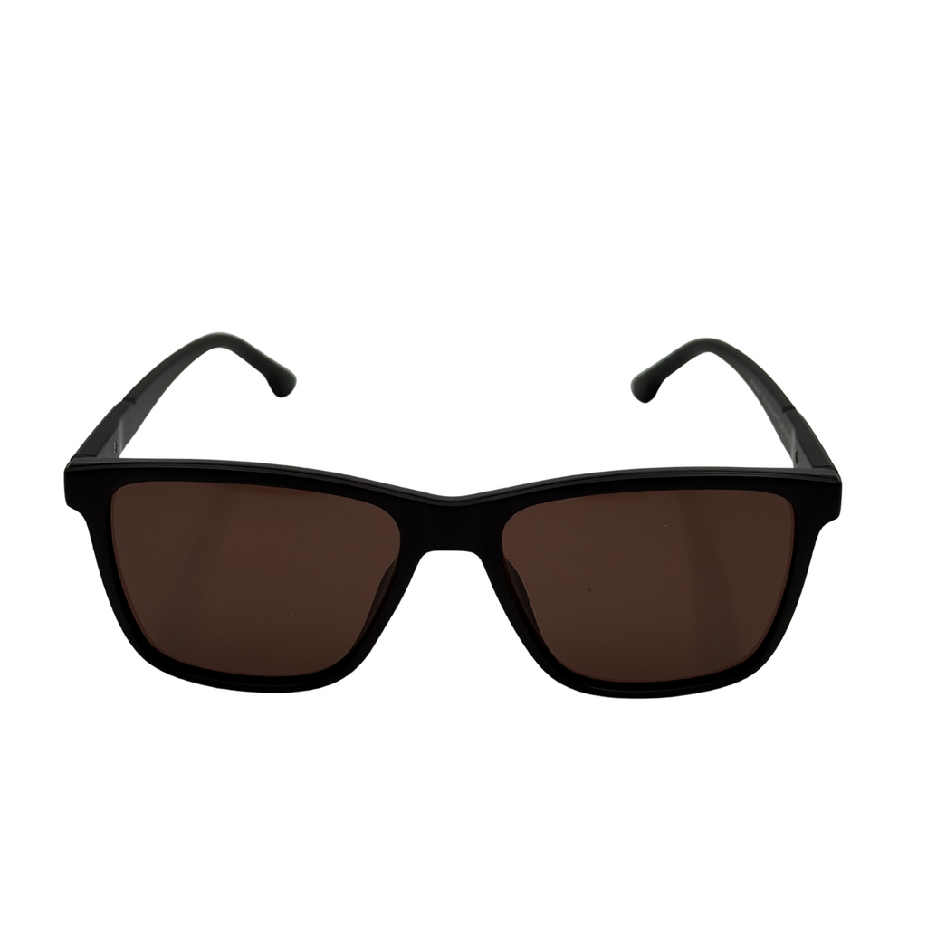 Black sunglasses with brown lenses on a white background