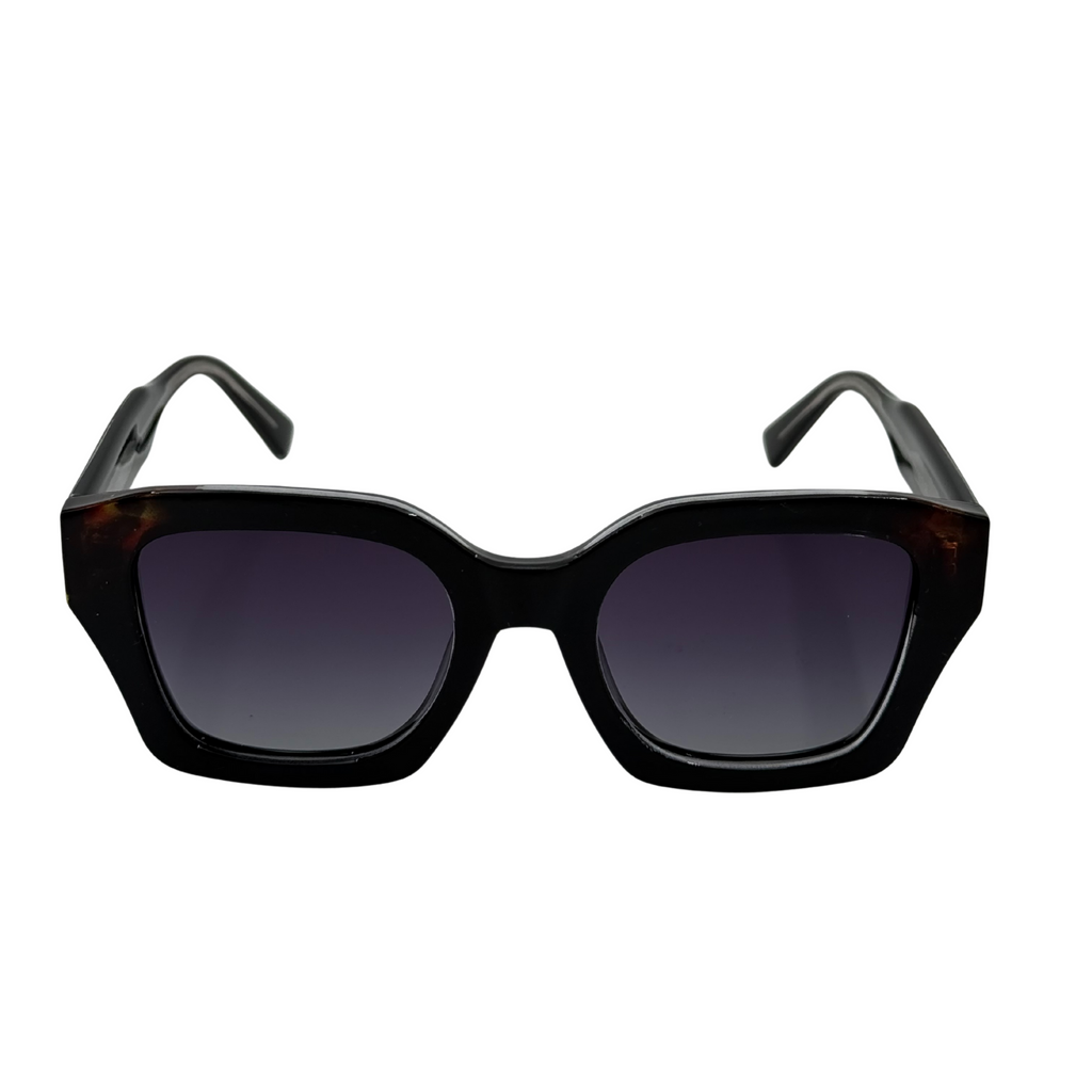 Black sunglasses with dark lenses on a white background