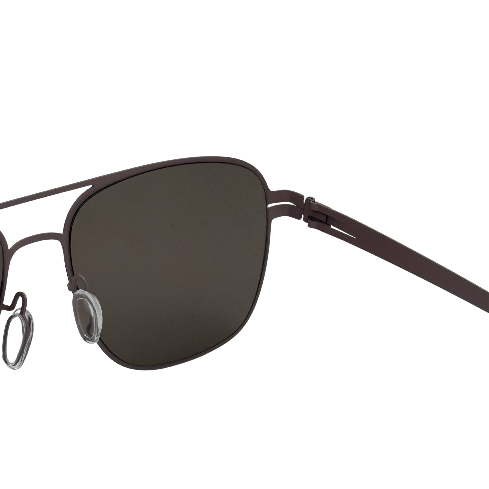 Sunglasses with dark lenses and thin metal frame on a white background