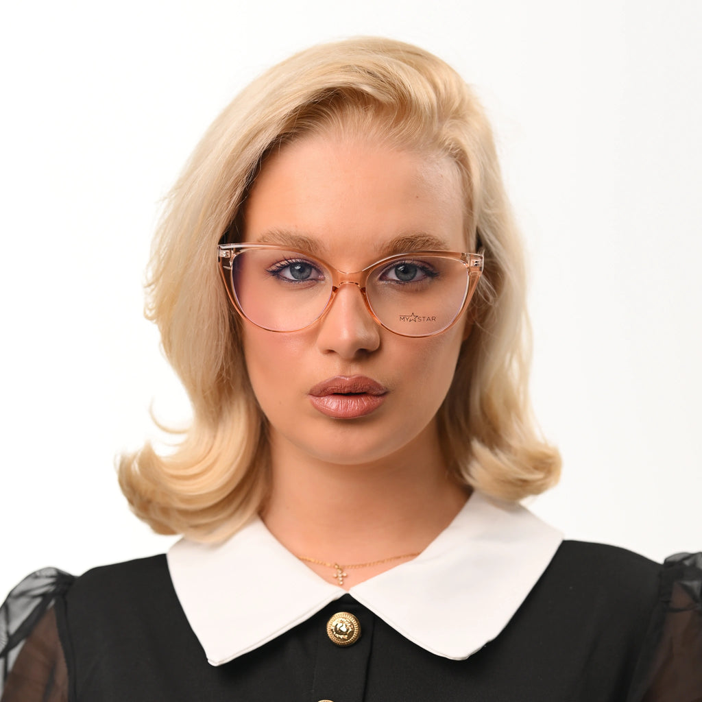 Woman wearing glasses and a black outfit with a white collar on a white background