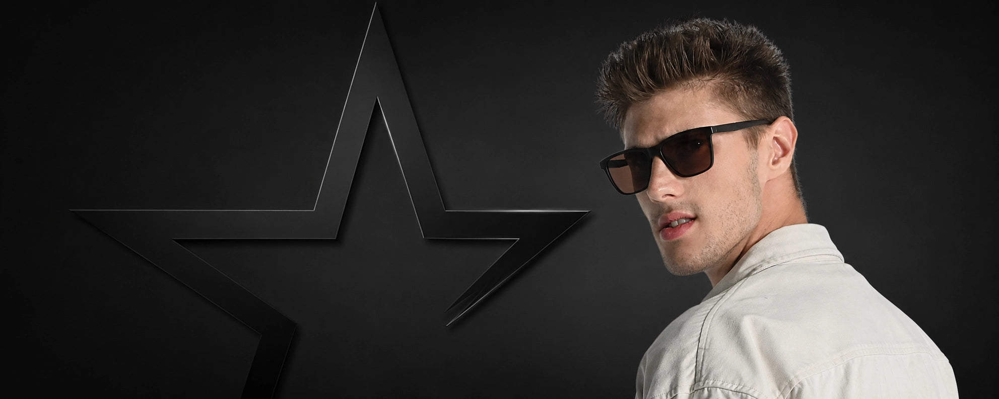 A man wearing black sunglasses and a white shirt, shown in profile against a dark background with a large black star graphic.