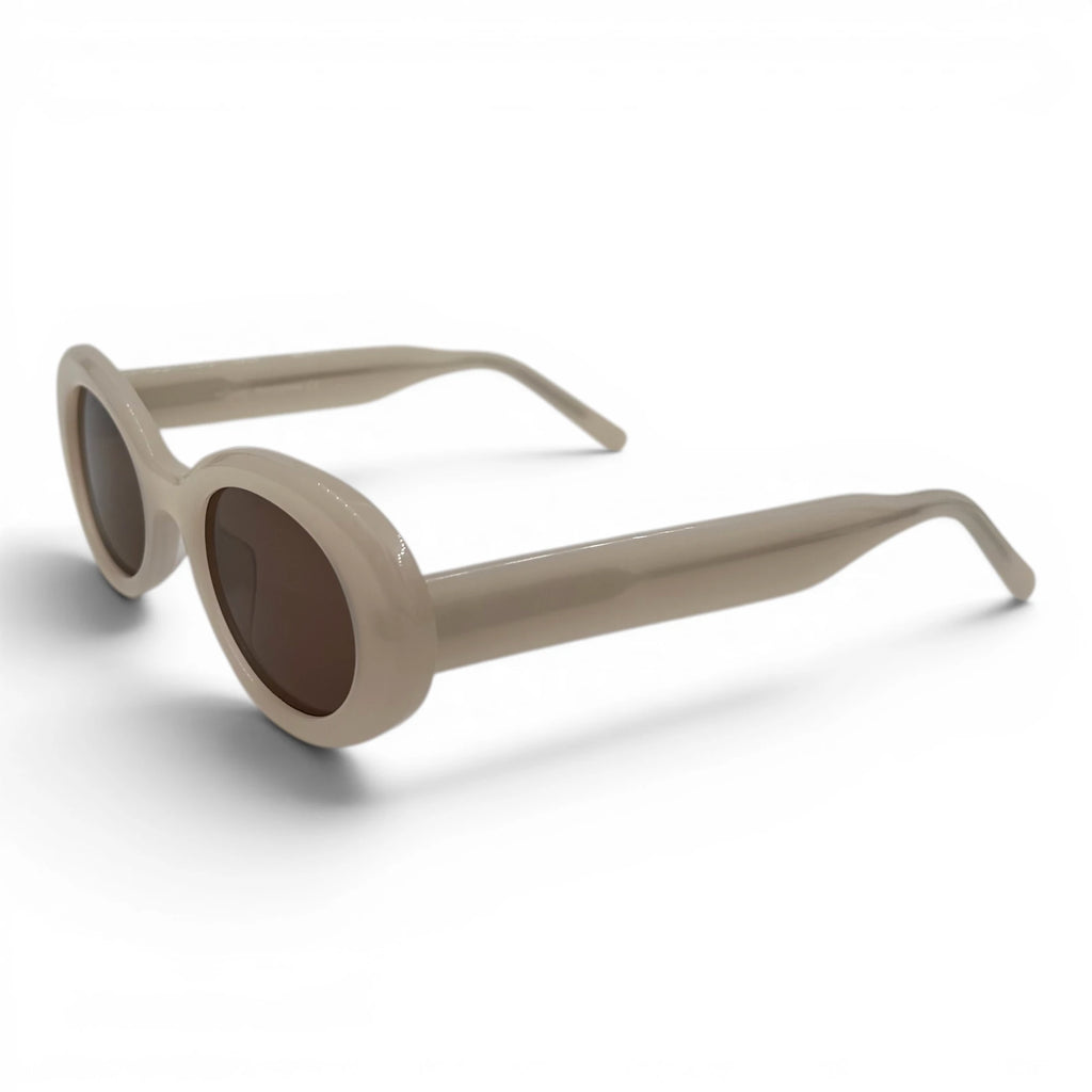 Beige sunglasses on a white background