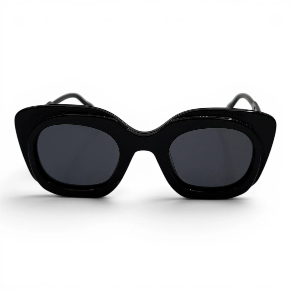 Black cat-eye sunglasses on a white background